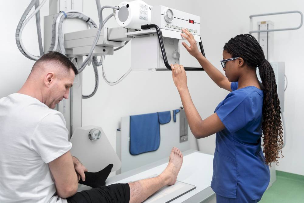 nurse taking medical imaging of patient